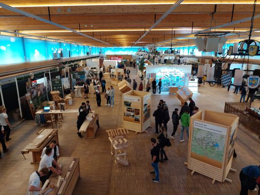 Holzbaumesse Rosenheim - Wir bauen auf heimisches Holz e.V.