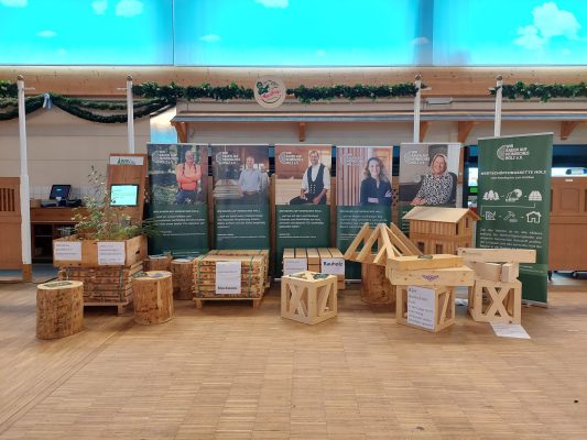 Holzbaumesse Rosenheim - Wir bauen auf heimisches Holz e.V.